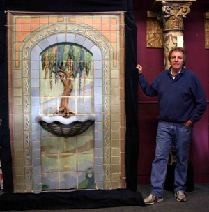 Wooden Nickel Antiques owner Michael Williams stands beside the recovered fountain in the Wooden Nickel showroom. Image courtesy of Wooden Nickel Antiques.